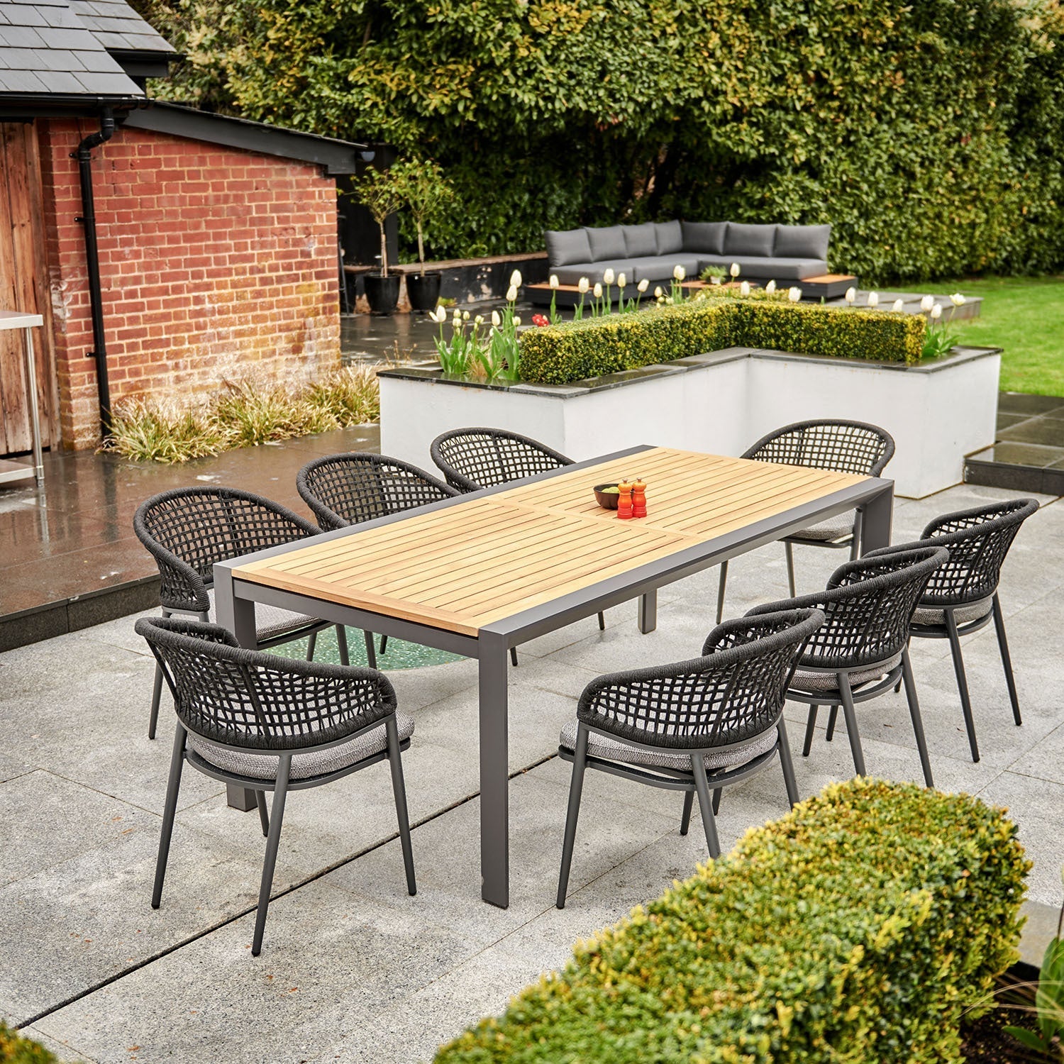 Kalama 10 Seat Rectangular Extending Dining Set with Teak Table in Charcoal