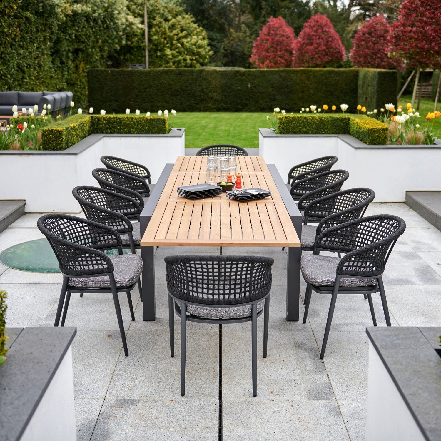 Kalama 10 Seat Rectangular Extending Dining Set with Teak Table in Charcoal