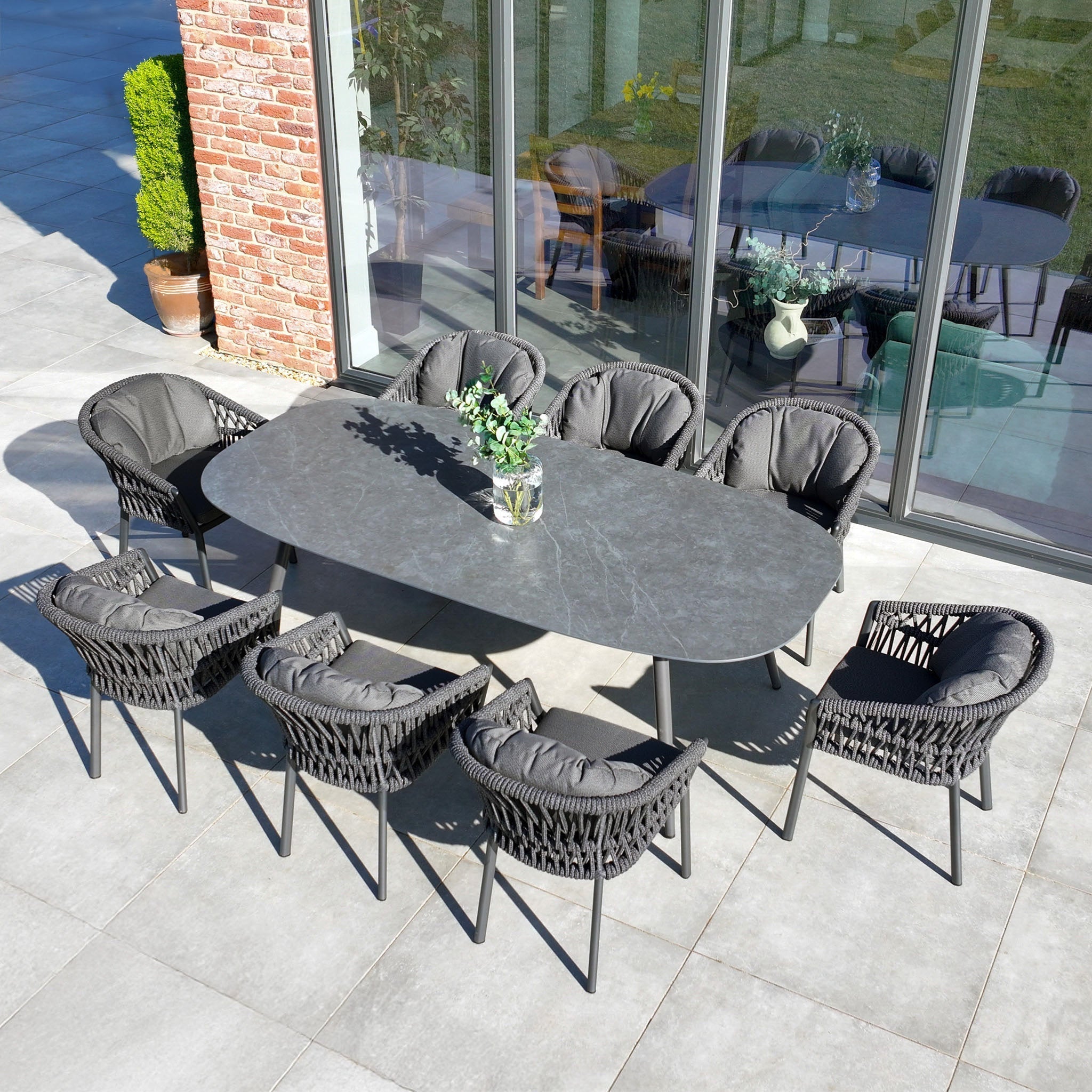Pello 8 Seat Oval Dining Set with Ceramic Table in Grey