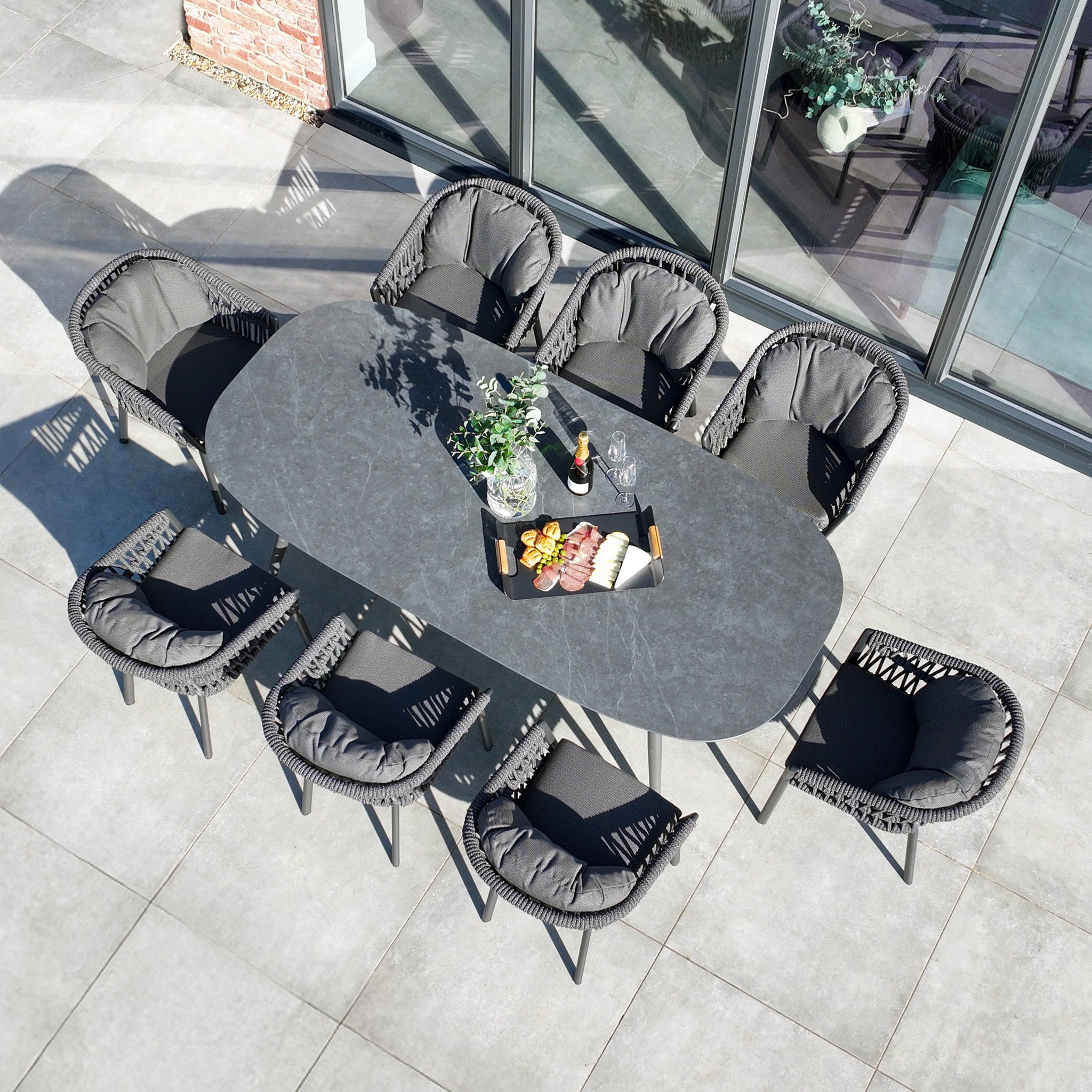 Pello 8 Seat Oval Dining Set with Ceramic Table in Grey