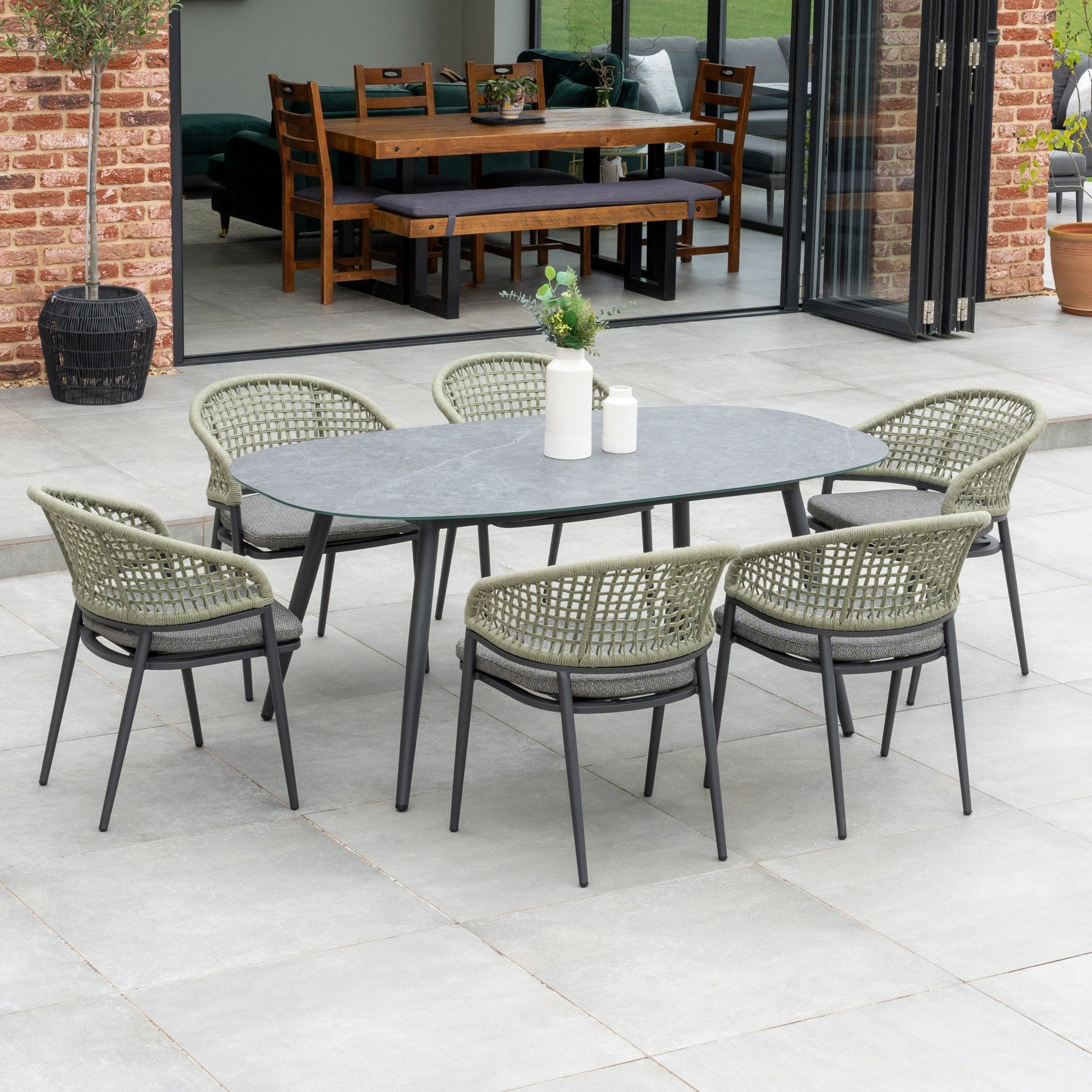 Kalama 6 Seat Rope Oval Dining Set with Ceramic Table in Olive Green