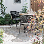 Kalama 4 Seat Round Dining Set with Teak Table in Charcoal