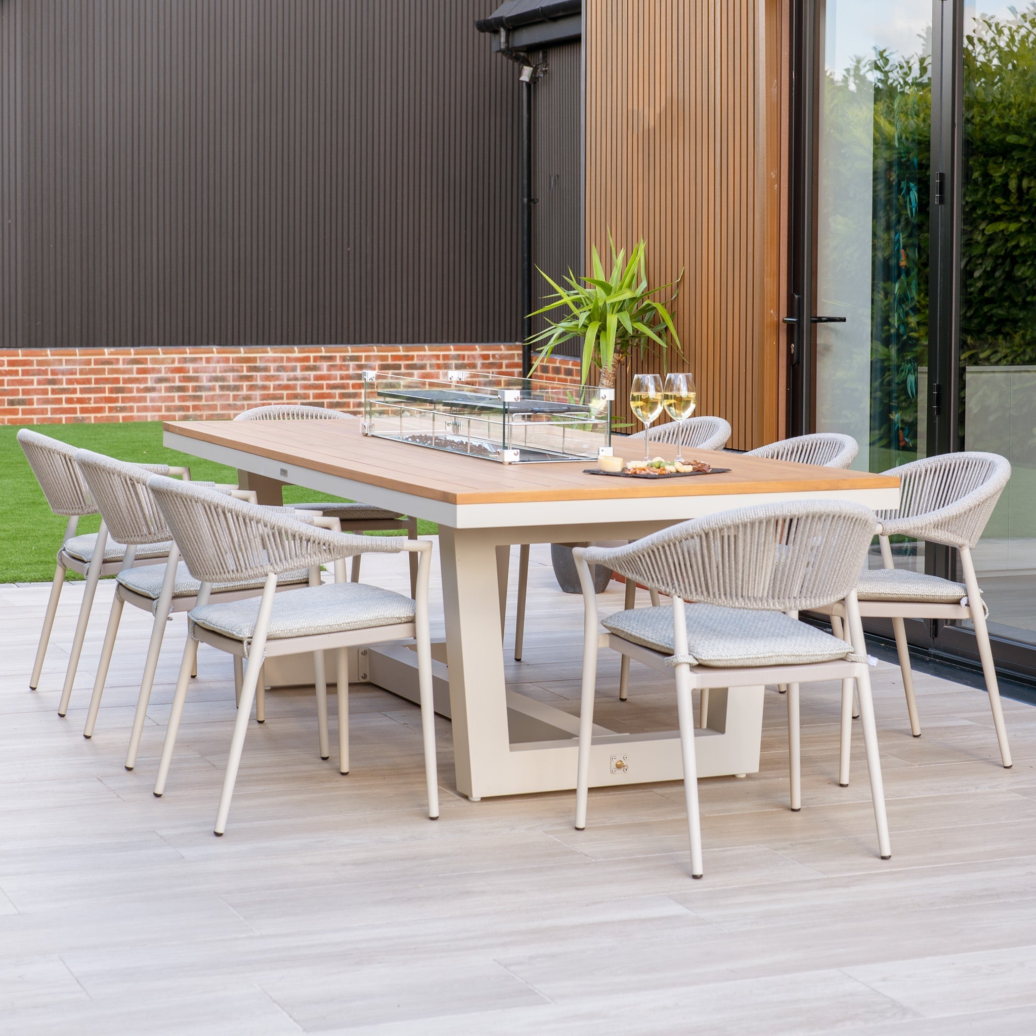 Cloverly 8 Seat Rectangular Teak Firepit Dining Set in Latte