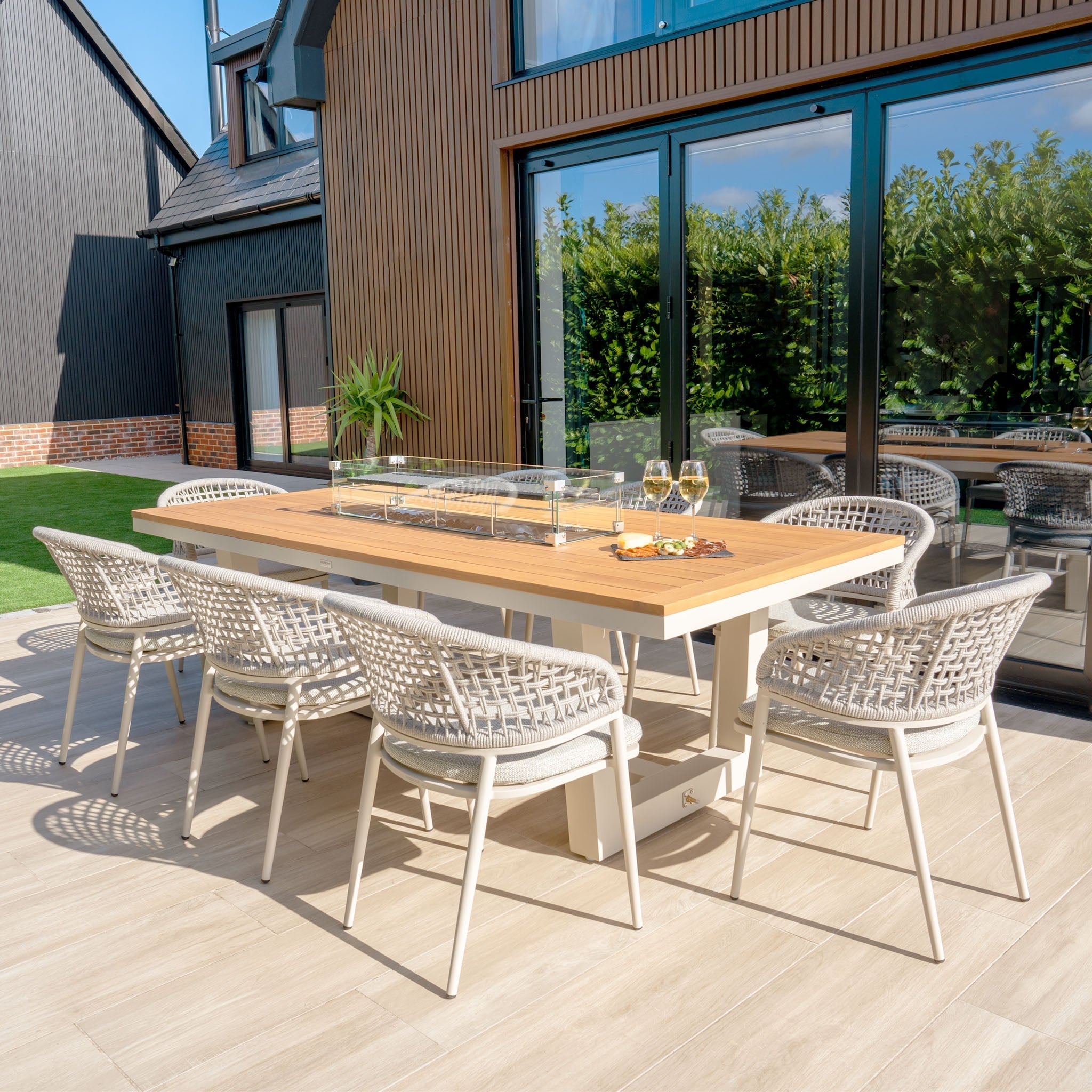 Kalama 8 Seat Rectangular Teak Firepit Dining Set in Latte