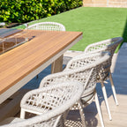 Kalama 8 Seat Rectangular Teak Firepit Dining Set in Latte
