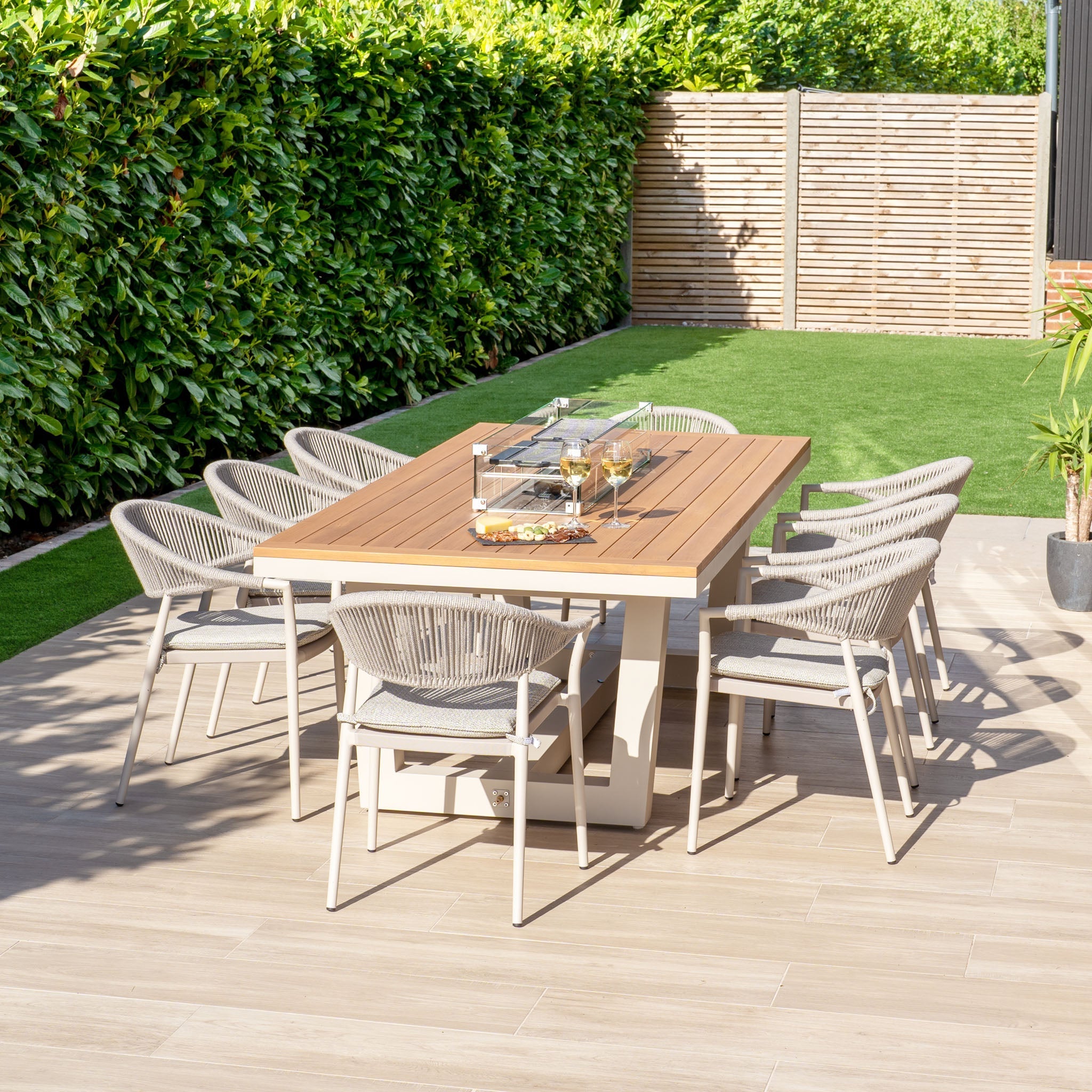 Cloverly 8 Seat Rectangular Teak Firepit Dining Set in Latte