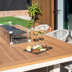Cloverly 8 Seat Rectangular Teak Firepit Dining Set in Latte