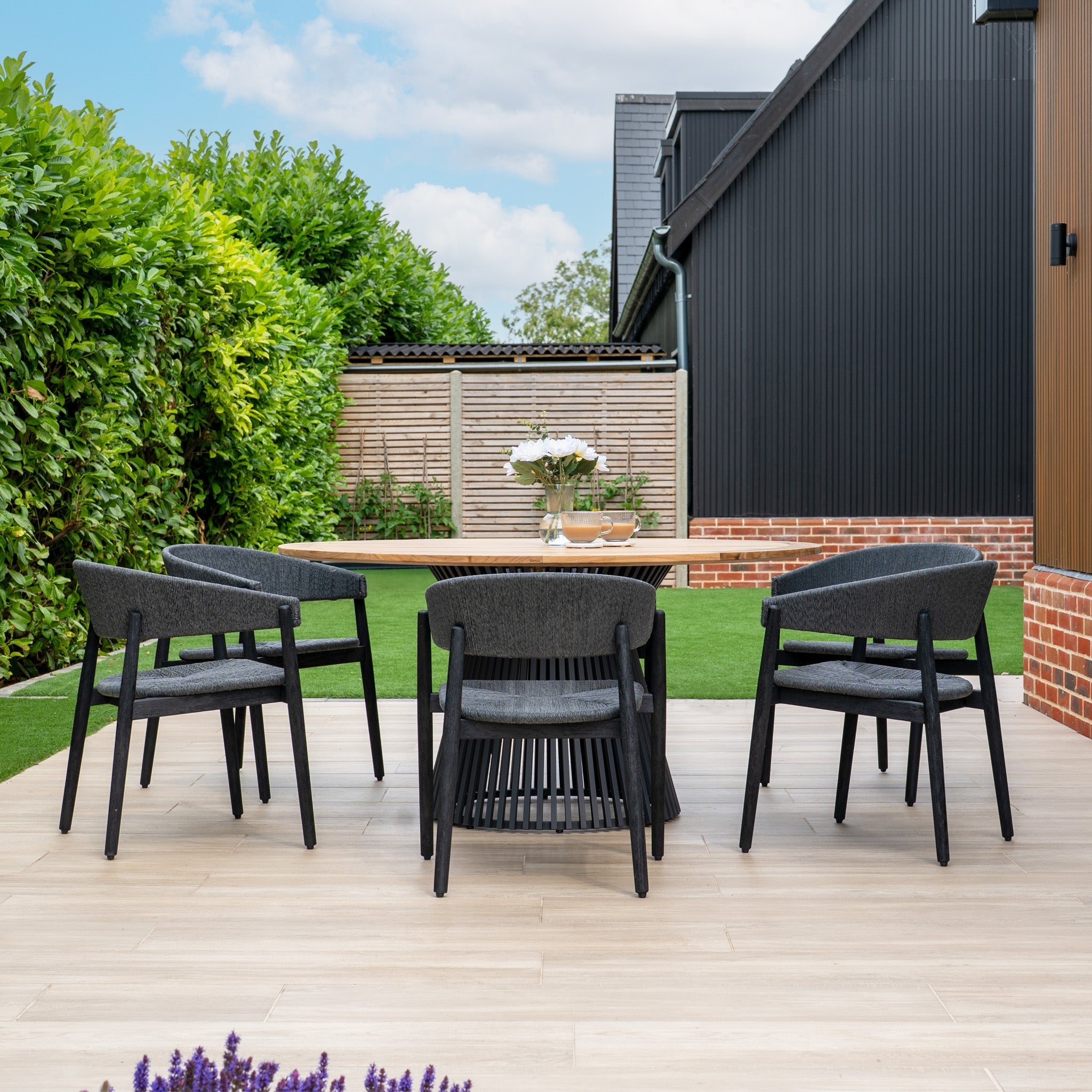 Lucca 6 Seat Dining Set with Teak Round Table in Black