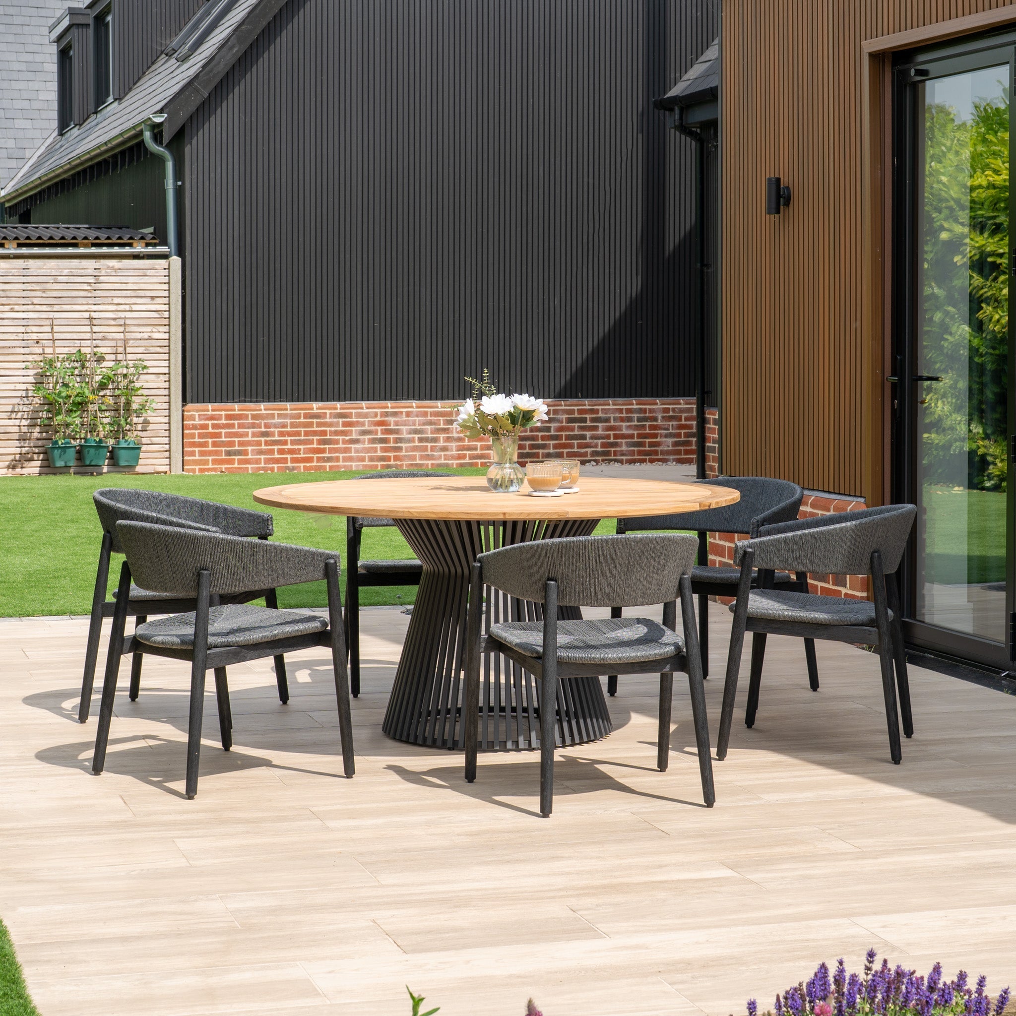 Lucca 6 Seat Dining Set with Teak Round Table in Black