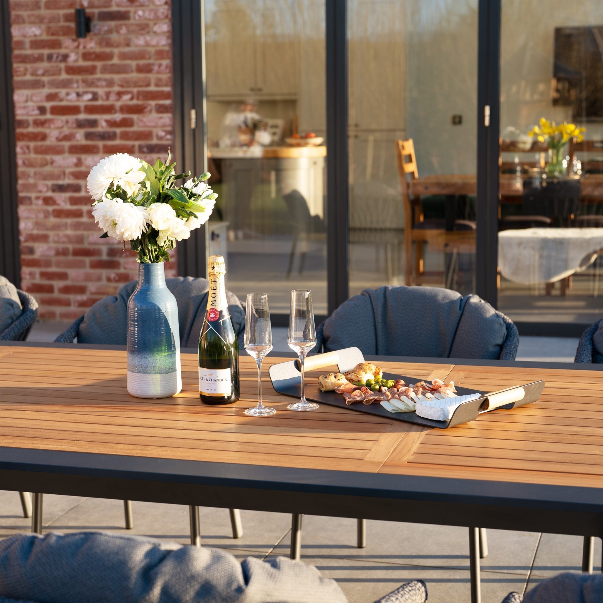 Pello 10 Seat Extending Dining Set with Teak Table in Grey