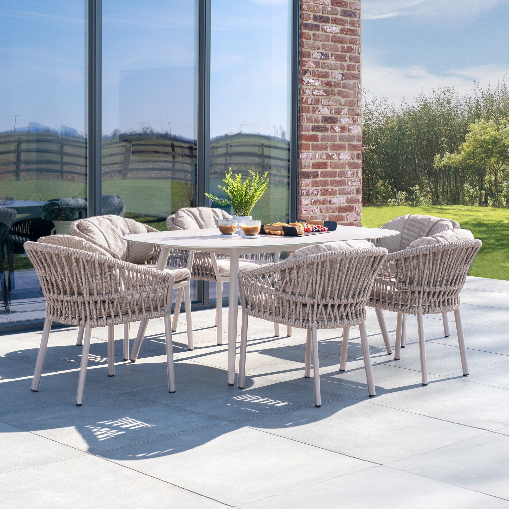 Pello 6 Seat Oval Dining Set with Ceramic Table in Fawn