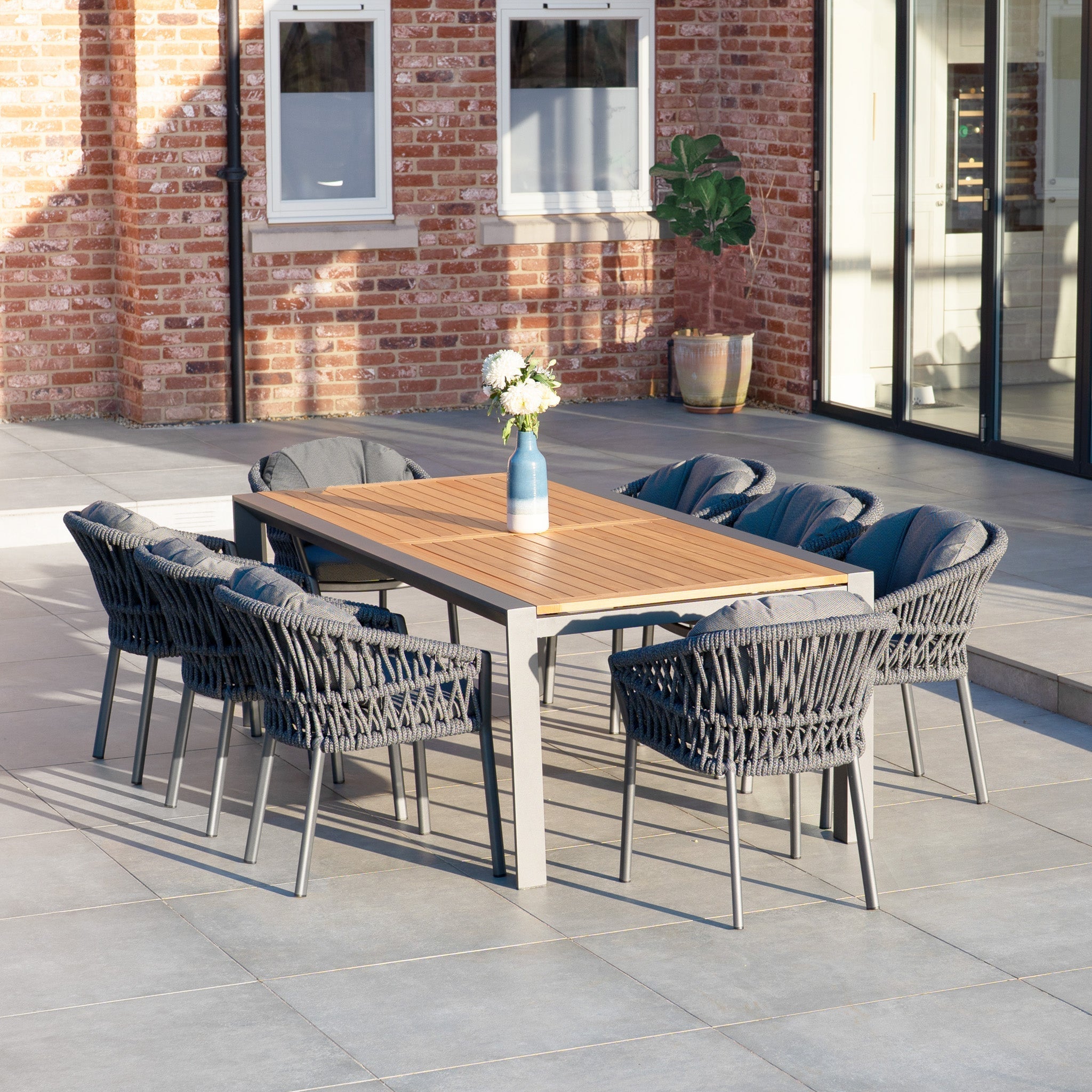 Pello 8 Seat Extending Dining Set with Teak Table in Grey