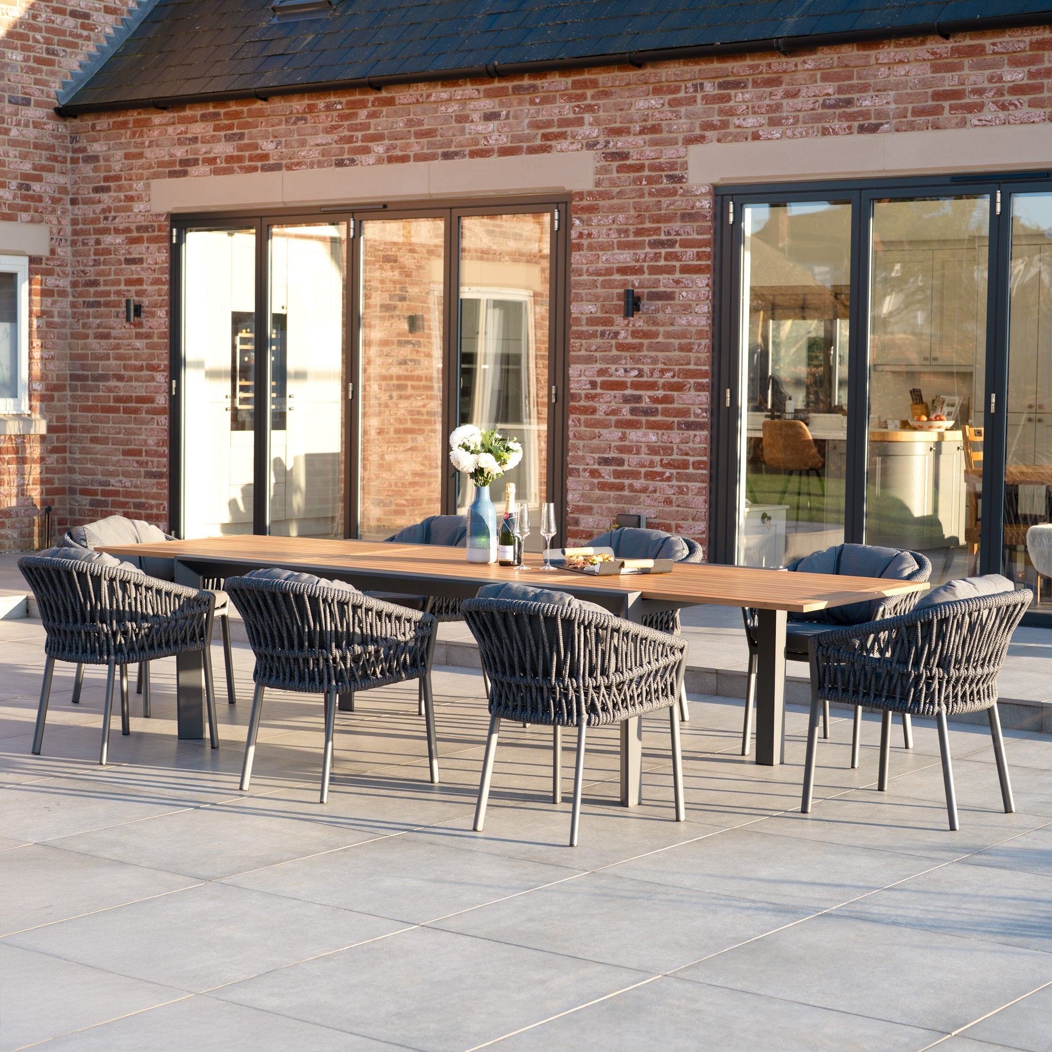 Pello 8 Seat Extending Dining Set with Teak Table in Grey
