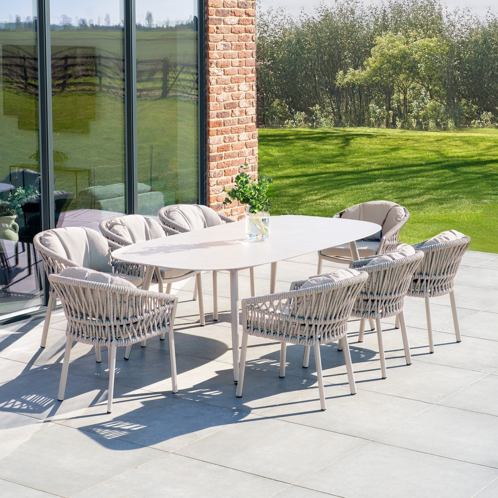 Pello 8 Seat Oval Dining Set with Ceramic Table in Fawn