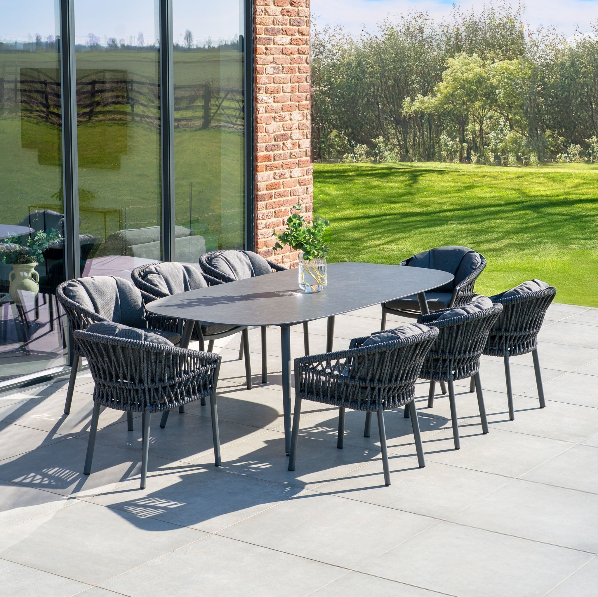 Pello 8 Seat Oval Dining Set with Ceramic Table in Grey