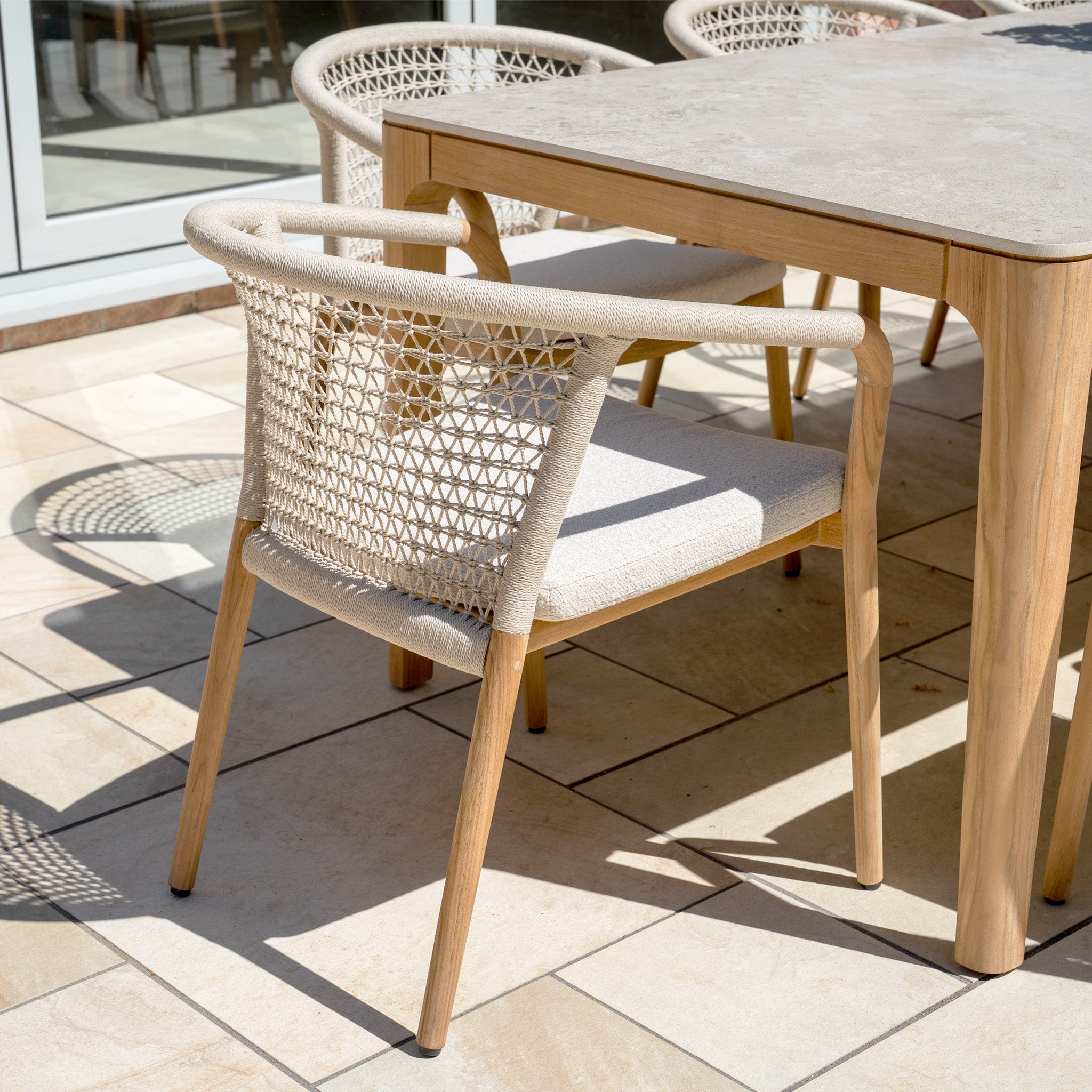 Sora 8 Seat Rope Dining Set with Ceramic Top Table in Stone