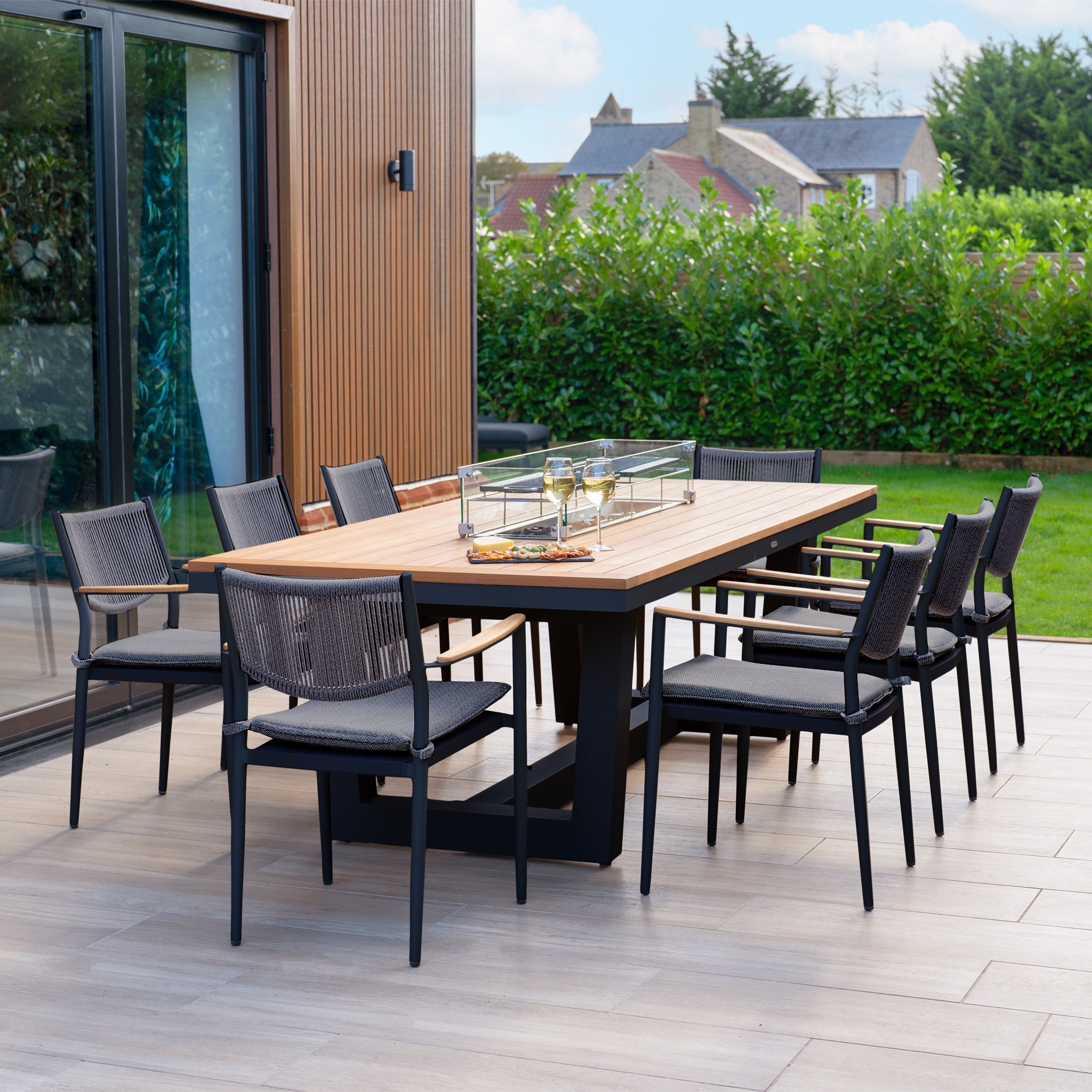 Tellaro 8 Seat Rectangular Teak Firepit Dining Set in Charcoal