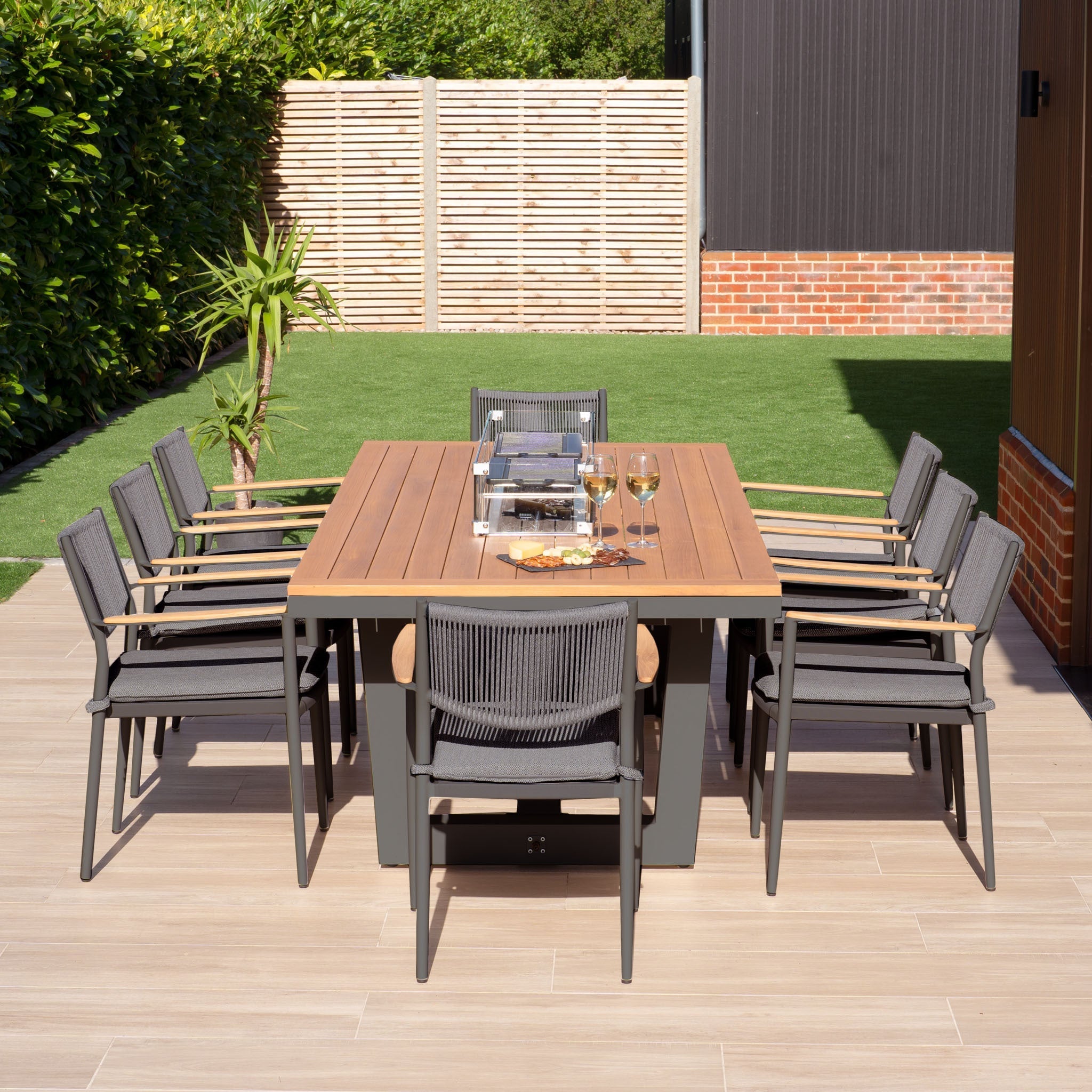 Tellaro 8 Seat Rectangular Teak Firepit Dining Set in Charcoal