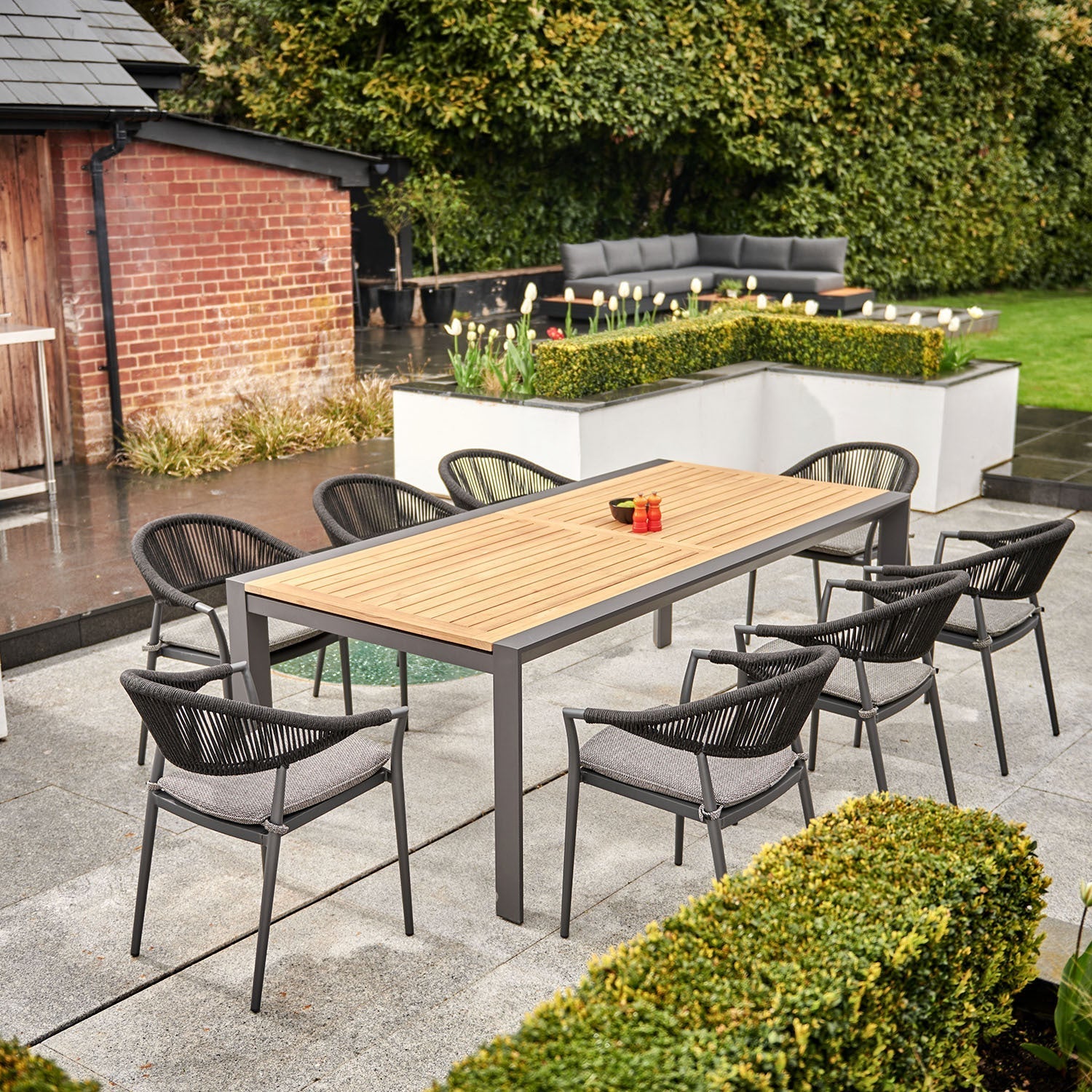 Cloverly 10 Seat Rectangular Extending Dining Set with Teak Table in Charcoal