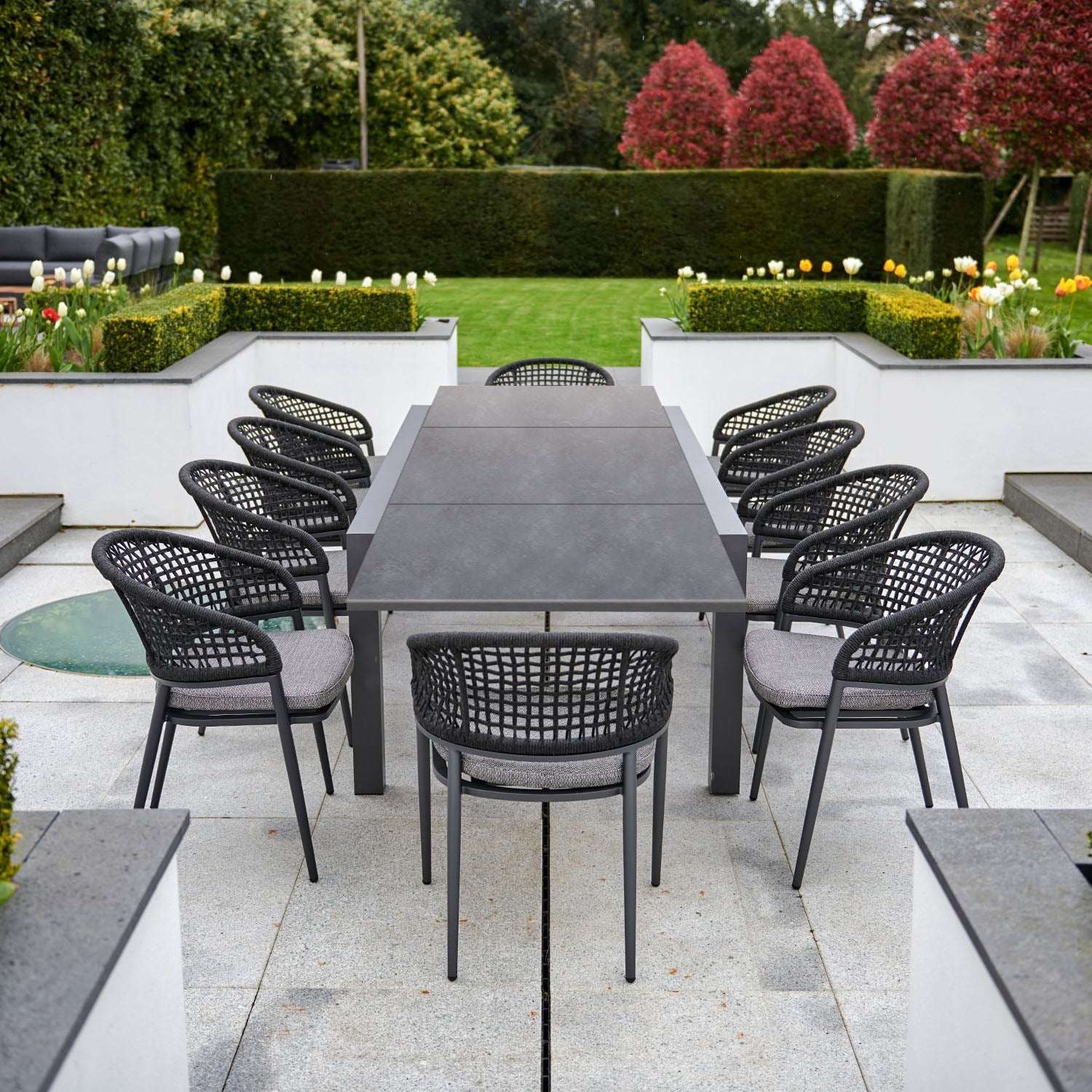 Kalama 10 Seat Rectangular Extending Dining Set with Ceramic Table in Charcoal