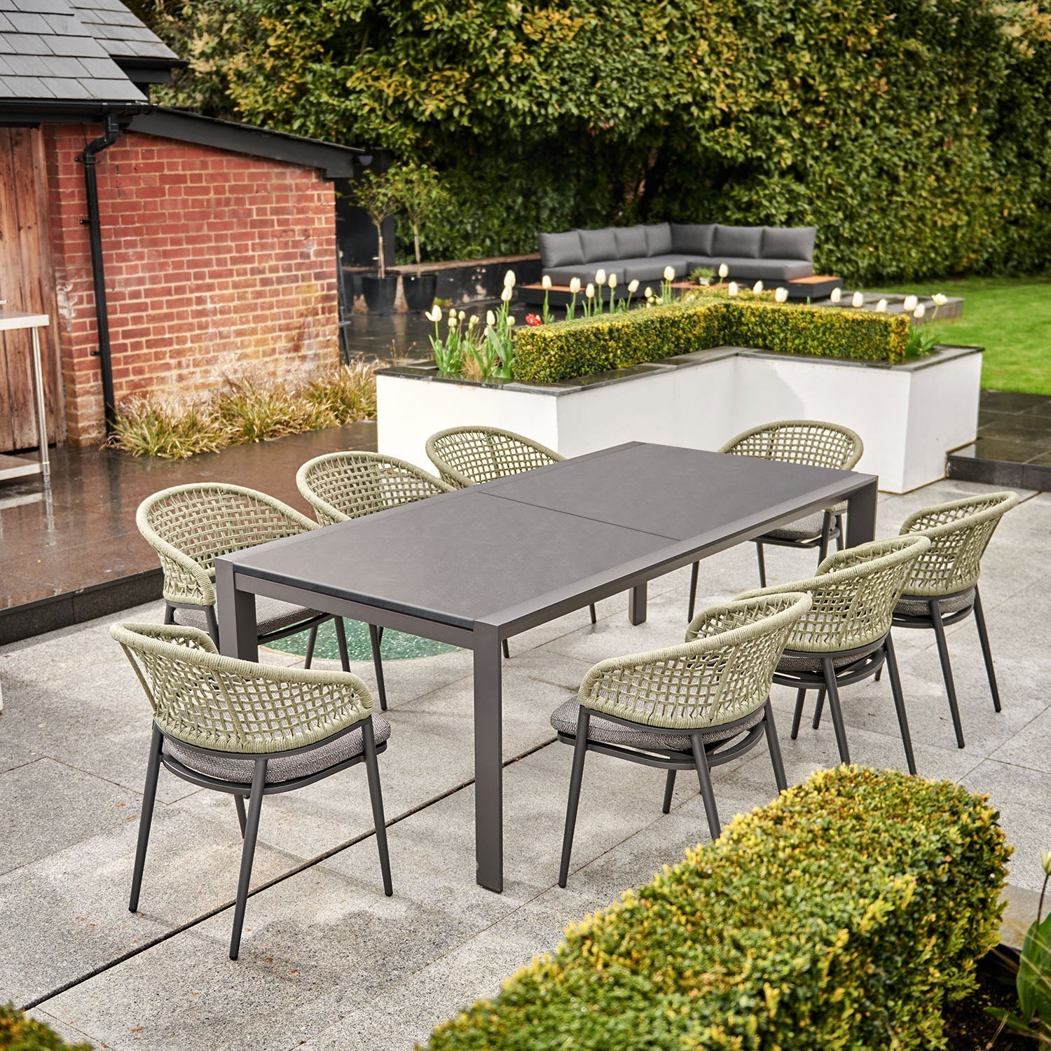 Kalama 10 Seat Rectangular Extending Dining Set with Ceramic Table in Olive Green